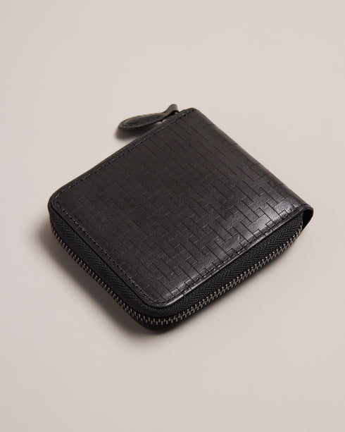 TOBIAT-Wallets-Take your style from casual to elevated with TOBIAT. With a zip-around fastening, inside pocket and multiple card slots, you’ll be able to hold on to all your essentials with ease.By purchasing this product, you are supporting responsible leather manufacturing through the Leather Working Group. Wallet Leather T monogram texture Zip around fastening Card slots Inside pocket Ted Baker branded embellishment Dimensions: 2cm x 9cm x 11cm- Ted Baker Romania